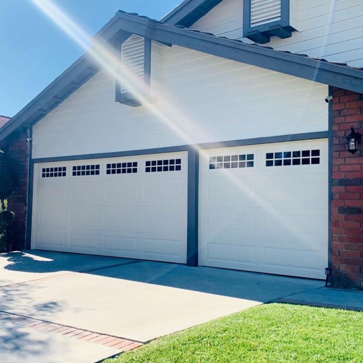 Carriage-style wood garage door installation, San Diego County